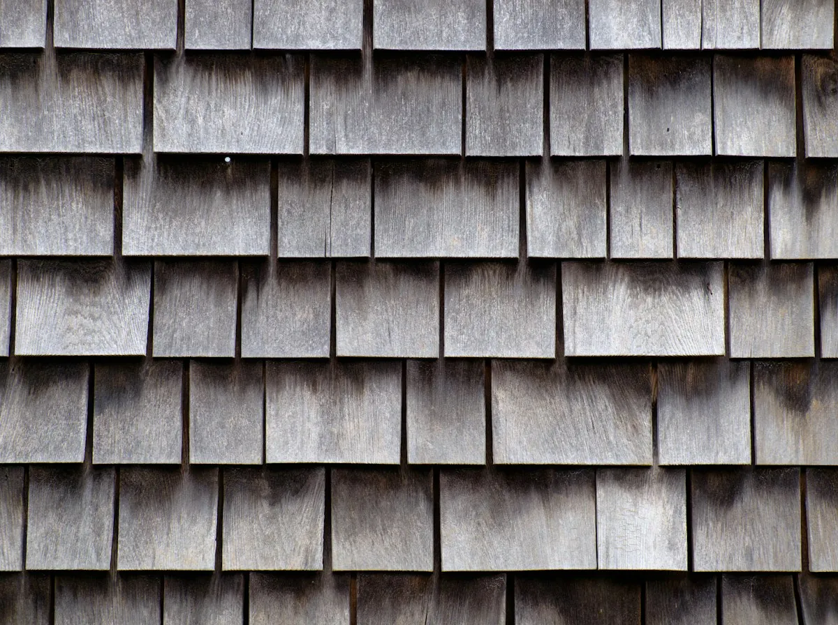 Partial Roof Replacement in El Monte — weathered gray cedar shakes in overlapping rows